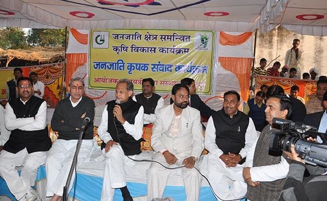 Mr. Ashok Gehlot, Chief Minister of Rajasthan interacting with our tribal beneficiaries in village Pilader, block Sarada.